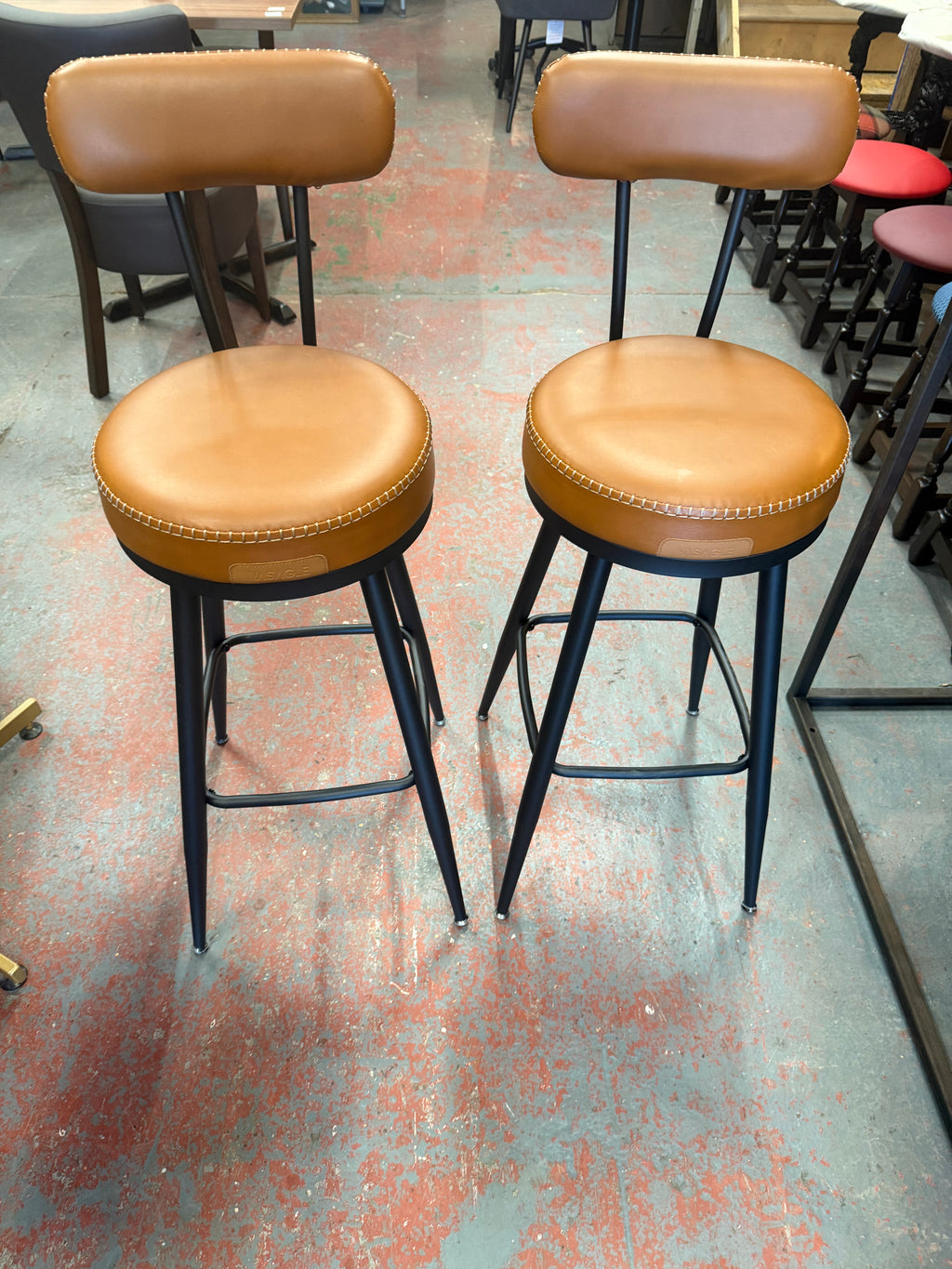 Brown leather swivel high bar stools