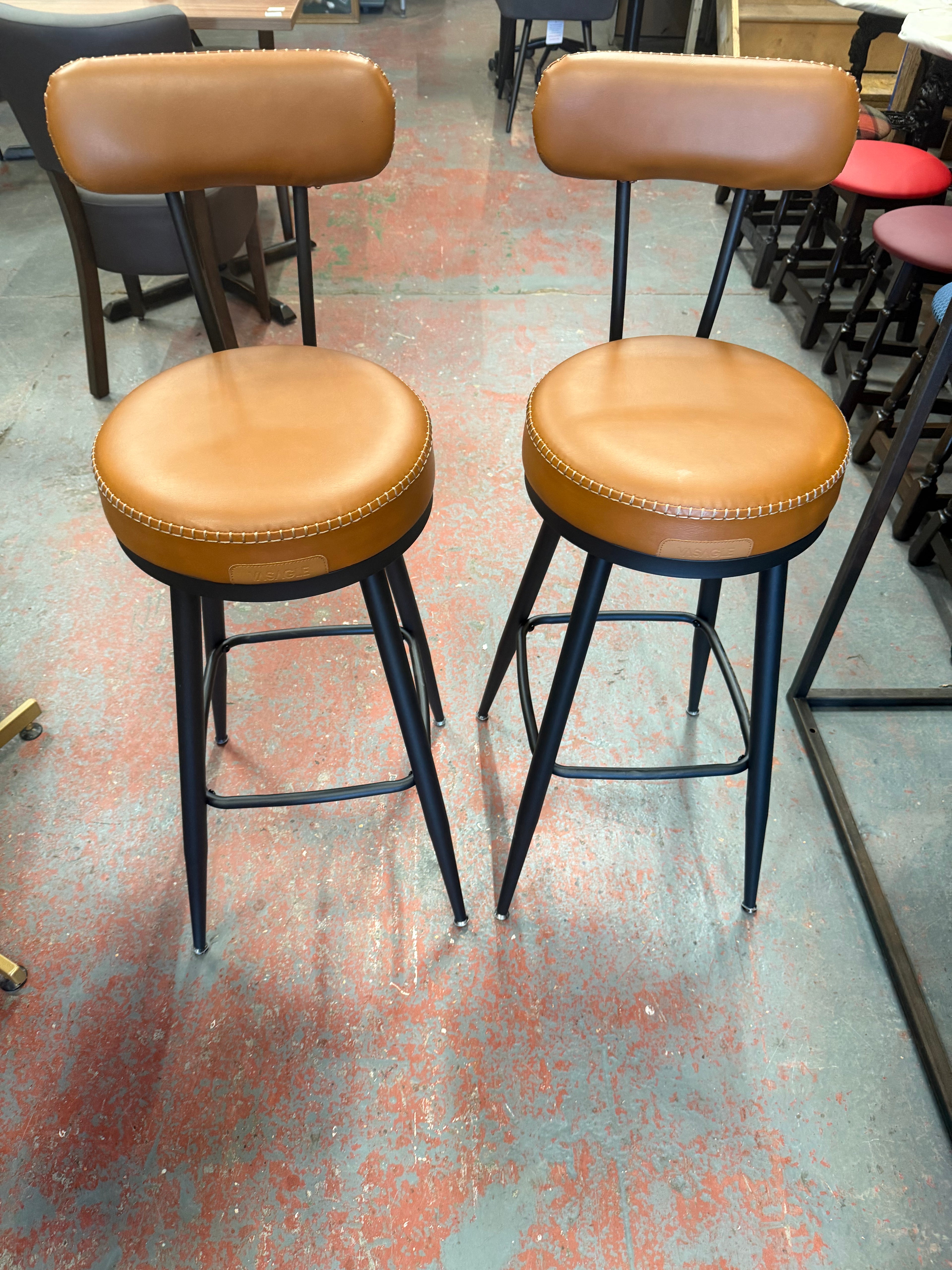 Brown leather swivel high bar stools