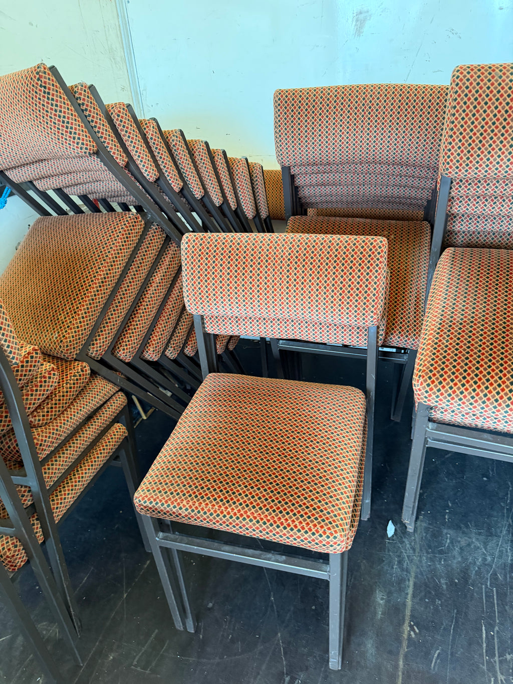 Solid stackable banqueting chairs