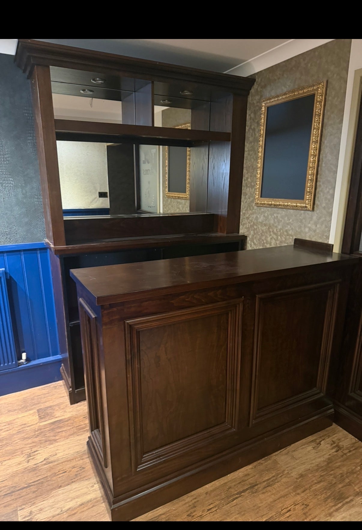 Solid mahogany bar with mirrored back bar
